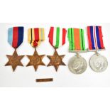 A WWII medal group of five awarded to Mr C.J. Tovey of Nottingham comprising Defence and General