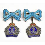 Two silver and enamelled Royal Navy sweetheart brooches with blue bow attachments (2).