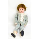 WILLIAM GOEBEL; an early 20th century German bisque headed doll with brown wig (now separated),