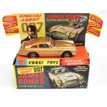 CORGI; a boxed 261 James Bond Aston Martin D.B.5 with two internal figures on pictorial card display