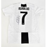 CRISTIANO RONALDO; a Juventus Adidas home shirt, signed to the reverse with 'Ronaldo 7' printing,