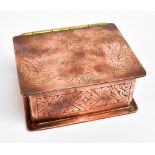 A copper trench art rectangular box, the lid with brass hinge and engraved with WWI battle names