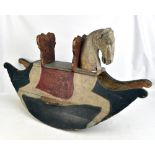 A painted pine primitive rocking horse, length 120cm.Additional InformationMany splits/scratches,