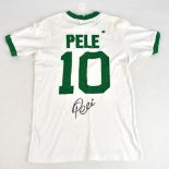 PELE (EDSON ARANTES DO NASCIMENTO); an Umbro retro-style New York Cosmos shirt, signed to the