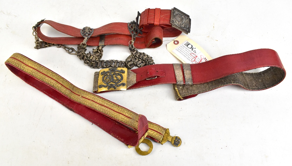 A maroon leather, silk and brass belt with buckle inscribed 'Princess Louisa's Argyle and Sutherland