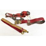 A maroon leather, silk and brass belt with buckle inscribed 'Princess Louisa's Argyle and Sutherland