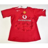 MANCHESTER UNITED; a 2004 Nike home shirt, signed by Saha, Ferdinand, Giggs, Scholes, Kleberson,