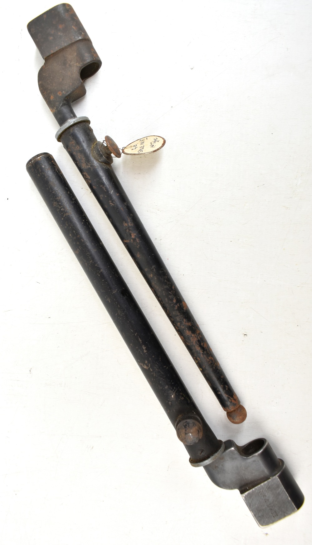 A pair of WWII period British Enfield No.4 socket bayonets with scabbards, length of each 27cm.