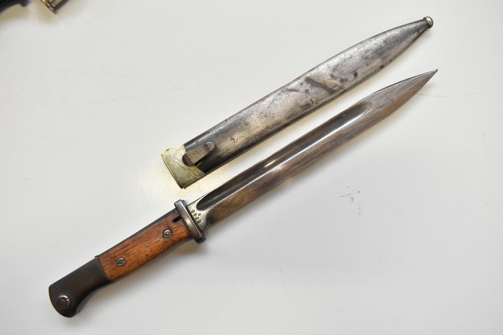 F. HERDER; a WWI period Walter & Co bayonet and scabbard, length 40.5cm, two further bayonets and - Image 2 of 9