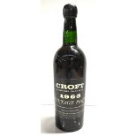 PORT; a single bottle of Croft 1963 Vintage Port.Additional InformationLevel base and neck, creasing