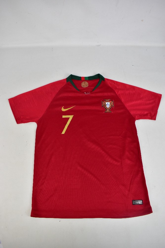 CRISTIANO RONALDO; a Portugal Nike home shirt, signed to the reverse with 'Ronaldo 7' printing, size - Image 2 of 2