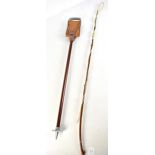 A large leather handled whip, length approx 450cm, and a shooting stick (2).Additional