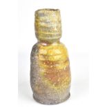UWE LOELLMANN (born 1955); a wood fired stoneware bottle, impressed mark, height 23cm. (D) Born in