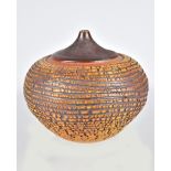 CARRIE DOMAN; a squat stoneware vase with heavily textured surface, incised signature and dated