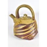 DAVID CARADORI (born 1959); a faceted wood fired stoneware teapot, impressed marks, height 18.5cm.