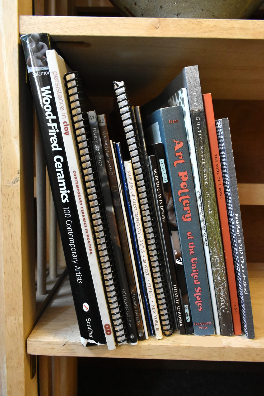 A collection of books and pamphlets on American studio ceramics.