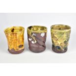 JEAN-NICOLAS GERARD (born 1954); a group of three tall slipware beakers with sgraffito and finger