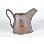 BRUCE COCHRANE; a wood fired stoneware pitcher, incised signature, height 18.5cm. Cochrane is