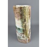 RACHEL WOOD (born 1962): a large cylindrical stoneware vessel covered in layered slips and glaze,