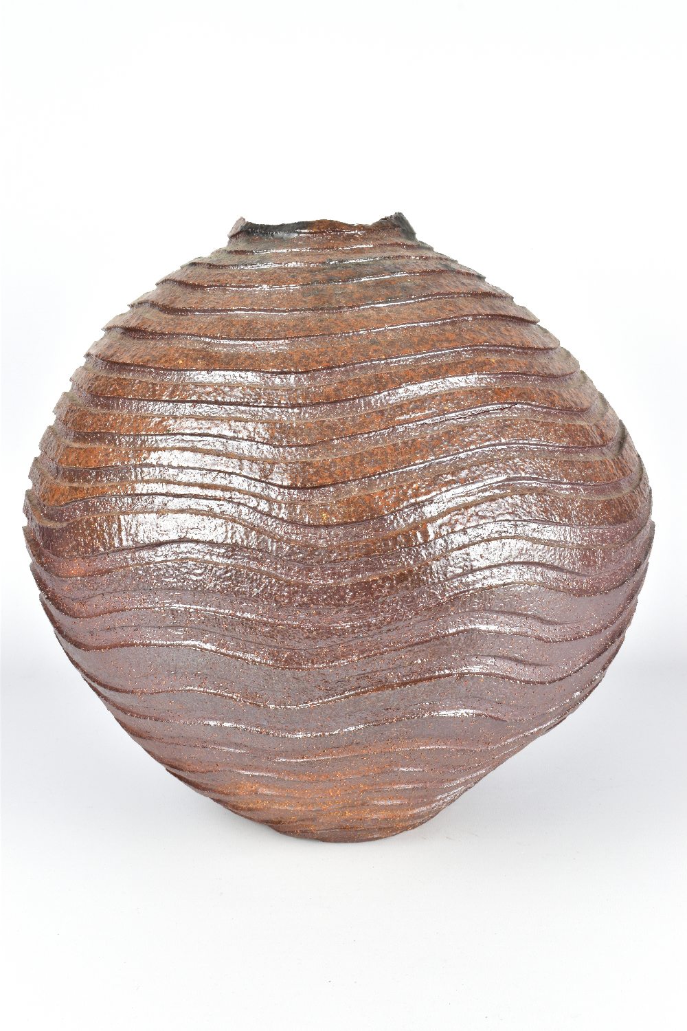 CLAYTON AMEMIYA; a large wood fired stoneware moon jar with deeply carved surface, incised CA