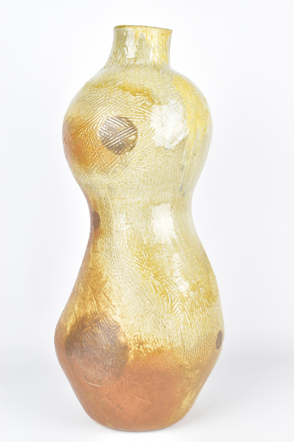 LORI ALLEN; a tall wood fired stoneware bottle, 'Gourd 2', surface pattern with circle decoration,