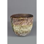 RACHEL WOOD (born 1962): a stoneware pinched bowl covered in layered slips and glaze, incised W