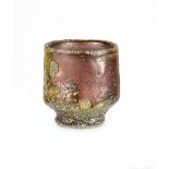 JIM BUSBY (born 1976); a small wood fired stoneware cup, height 6cm. Provenance: Purchased from