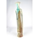 CINDY HOSKISSON; a tall leaning stoneware bottle, 'Ashes and Flux Vase 3', with running turquoise