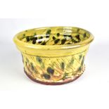 JEAN-NICOLAS GERARD (born 1954); a slipware salad bowl with sgraffito and finger spot decoration,