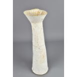 JANE WHEELER (born 1950); a tall tapered stoneware vessel with flared rim and textured surface,