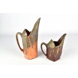 BEDE CLARKE; a square wood fired stoneware pitcher with tall spout and a matching smaller pitcher,