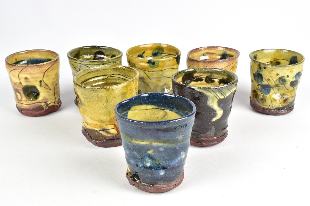 JEAN-NICOLAS GERARD (born 1954); a group of eight small slipware beakers with sgraffito and finger