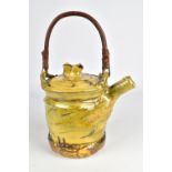 JEAN-NICOLAS GERARD (born 1954); a slipware teapot with willow handle and sgraffito and finger