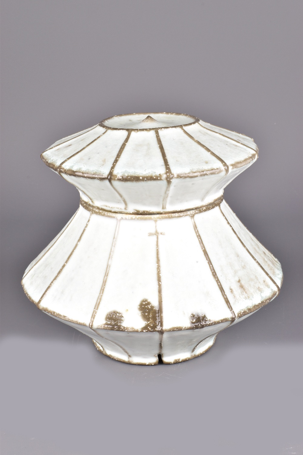 KENYON HANSEN; an angular porcelain jar and cover, impressed K mark, height 17.5cm. Provenance: