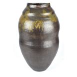 JANICE BROWN: a tall stoneware vase, incised mark, height 35cm. Provenance: Purchased in Hawaii,