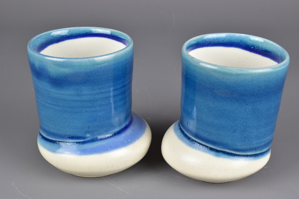 JENI HANSEN GARD; a pair of cups on off centre bases washed in blue glaze, tallest 10.5cm (2). - Image 3 of 6