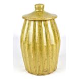 GUILLERMO CUELLAR (born 1951); a fluted stoneware jar and cover, impressed GC mark, height 26cm.