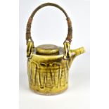 ANNE METTE HJORTSHOJ (born 1973); a salt glazed teapot with willow handle and porcelain slip,