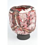 RAFAEL PEREZ (born 1957); a stoneware sculptural vessel with thick eruptive red and white glaze over