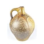 MARK HEWITT (born 1955); a wood fired salt glazed flagon, impressed WMH mark, height 27.5cm.