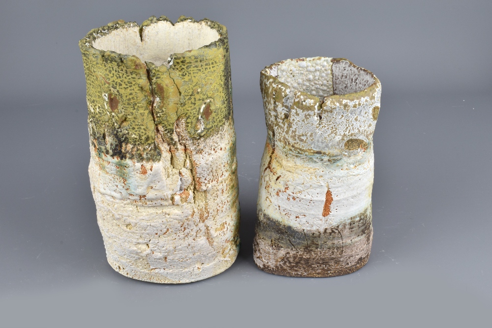 RACHEL WOOD (born 1962): a cylindrical stoneware vessel and a smaller waisted vessel both covered in