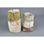 RACHEL WOOD (born 1962): a cylindrical stoneware vessel and a smaller waisted vessel both covered in