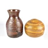 SHANNON HICKEY; a stoneware bottle with textured surface and a stoneware ball, incised signatures,
