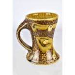 ANDREW DUTCHER; a waisted salt glazed mug, impressed A mark, height 11.5cm. Provenance: Purchased