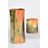 CONNIE CHRISTENSEN; an altered oval wood fired porcelain vase and a matching smaller vase, incised