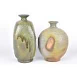 CLAYTON AMEMIYA; a square wood fired stoneware bottle and an oval bottle, incised CA marks,