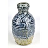 ANNE METTE HJORTSHOJ (born 1973); a salt glazed bottle with iron and cobalt slip and incised