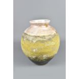 RACHEL WOOD (born 1962): a globular stoneware jar covered in layered slips and glaze, height 26.5cm.