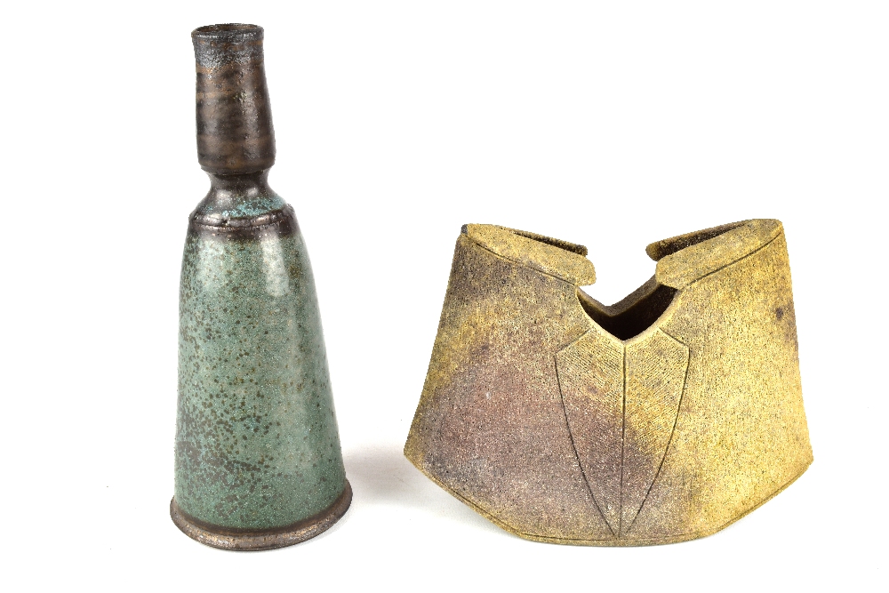 ERNEST GENTRY; an iron rich stoneware vase with incised shield-like decoration and a tapered