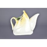 MARTHA GROVER; an altered porcelain jug, incised signature, height 13cm. Additional